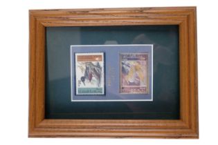 A 1990s white-metal "Duck Stamps of Israel" ingot and stamp pair, framed under acrylic, 22 x 17 cm