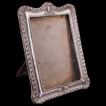 A Victorian silver-faced photograph frame having a gadrooned edge, Chester, 1899, 14 cm x 19 cm (