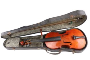 A Czecko-Slovakian cased violin and bow bearing a label reading "copy of Antonius Stradivarius",