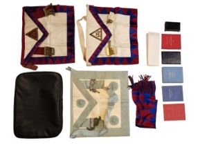 A cased group of Masonic regalia and ephemera including regulation, law and ritual booklets, circa