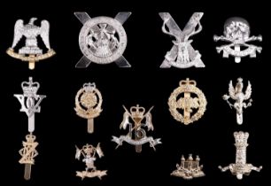 A small group of Staybrite cap badges