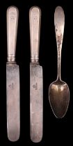 A pair of early 20th Century Russian white metal handled table knives, the handles having an