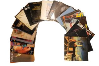 A quantity of LP vinyl records including Status Quo, Pink Floyd, Neil Diamond, etc