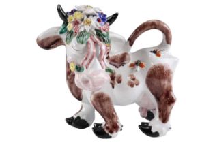 A Leopold Anzengruber glazed terracotta figurine of a stylised cow, 19 cm