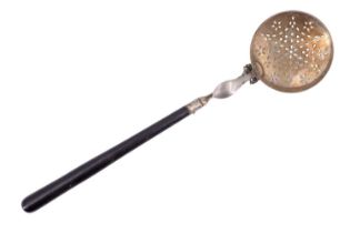An early 20th Century electroplated poached egg strainer having a turned ebonised handle, length