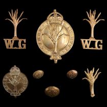 A group of Welsh Guards cap and other badges and insignia