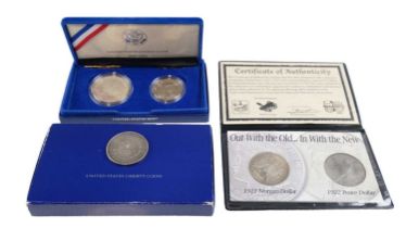 Three US silver one dollar coins comprising The American Heritage Mint 1921 Morgan Dollar and 1922