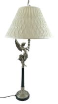 A contemporary table lamp modeled as a mythological winged figure, 100 cm overall