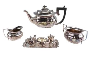 An Edwardian three-piece electroplated tea set of Georgian form together with a three-piece