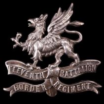 A reproduction 11th ( Lonsdale ) Battalion Border Regiment silver cap badge