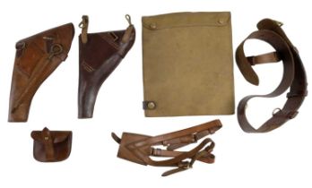 A quantity of British army officers' Sam Browne accoutrements including holsters, a sword frog,