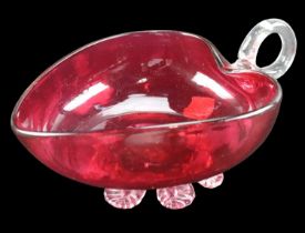 A cranberry glass leaf form sauce boat, 16.5 x 12 x 7.5 cm