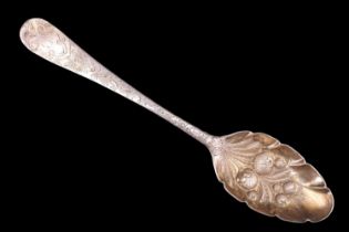 A Georgian and later silver berry spoon bearing chased floral decoration and an engraved initial "D"