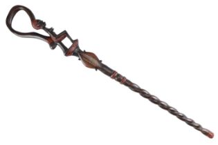 A mid-to-late 20th Century African carved hardwood walking stick, 96 cm