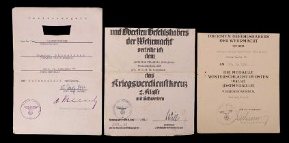 Three German Third Reich award citations, comprising clipped award citations to Friedrich Bösselmann