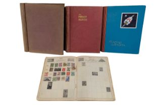 Three albums of world stamps together with an album of George V - QEII GB stamps and a quantity of