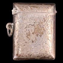 A George V silver fob vesta case profusely decorated with engraved foliate scrolls, Joseph Gloster