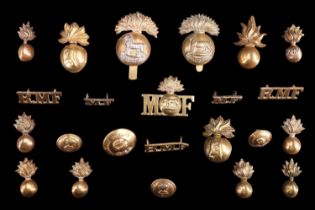 A group of Munster Fusiliers cap and other badges and insignia
