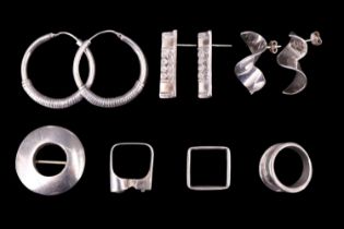 A quantity of contemporary silver and white metal jewellery, comprising three rings, three pairs