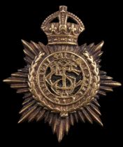 An Indian Supply and Transport Corps cap badge, of two-piece construction, 46 mm