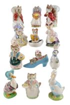 Ten Beswick Beatrix Potter figurines together with two other similar Wade and Royal Doulton