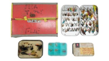 A Wheatley salmon and trout fishing fly box and contents together with four other boxes with flies