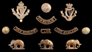 A group of Connaught Rangers cap and other badges and insignia