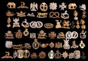 A collection of British army collar badges