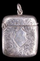 A Victorian silver fob vesta case with engraved scrolled decoration and inscribtion "John Felton",