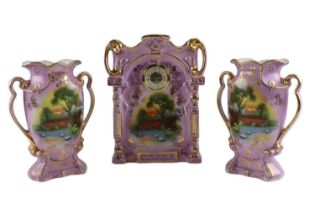 A late 19th / early 20th Century transfer printed and gilt-enriched lilac earthenware clock