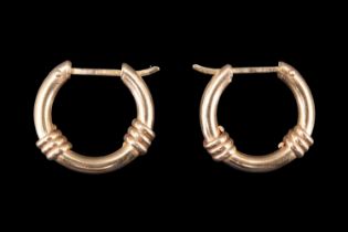 A pair of 9 ct gold earrings, each decorated with a pair of triple-reeded collars, import assay
