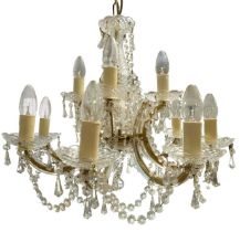 A late 20th Century12 branch crystal chandelier, having two tiers of four over eight branches, 56