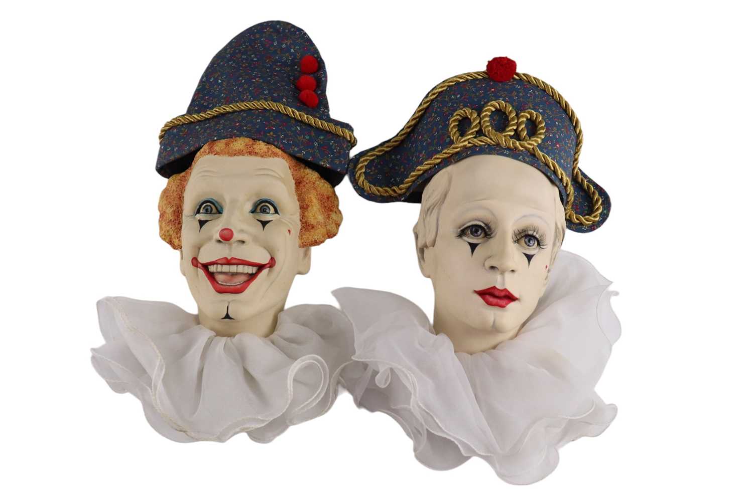 Two boxed Intermission Border Fine Arts clown wall masks by Ben Black comprising Auguste and