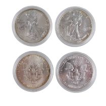 Four 1oz fine silver American Silver Eagle one dollar coins comprising 1986, 1987, 1988 and 1989