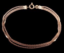 A 9 ct gold triple ribbon bracelet, London, 1981, 4.54 g, 18 cm