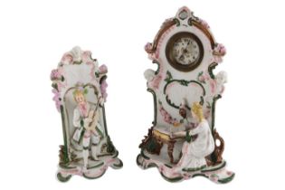 A late 19th / early 20th Century German figural porcelain clock, having modeled as a pianist