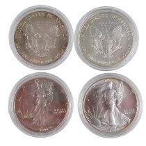 Four 1oz fine silver American Silver Eagle one dollar coins comprising 1990, 1991, 1992 and 1993