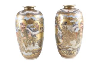 A pair of Japanese Satsuma vases, mon and character mark to the base, early-to-mid 20th Century,