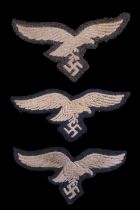 Three German Third Reich Luftwaffe tunic national emblems