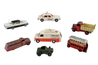 A small group of vintage diecast toy cars including a Dinky Police Accident Unit Ford Transit Van