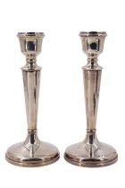 A pair of silver candlesticks, of tapering columnar form, filled, Birmingham, 1978, 20 cm Qty: 1