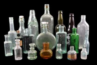 A quantity of antique and later glass bottles including a Codd's Patent for Mackintosh's of