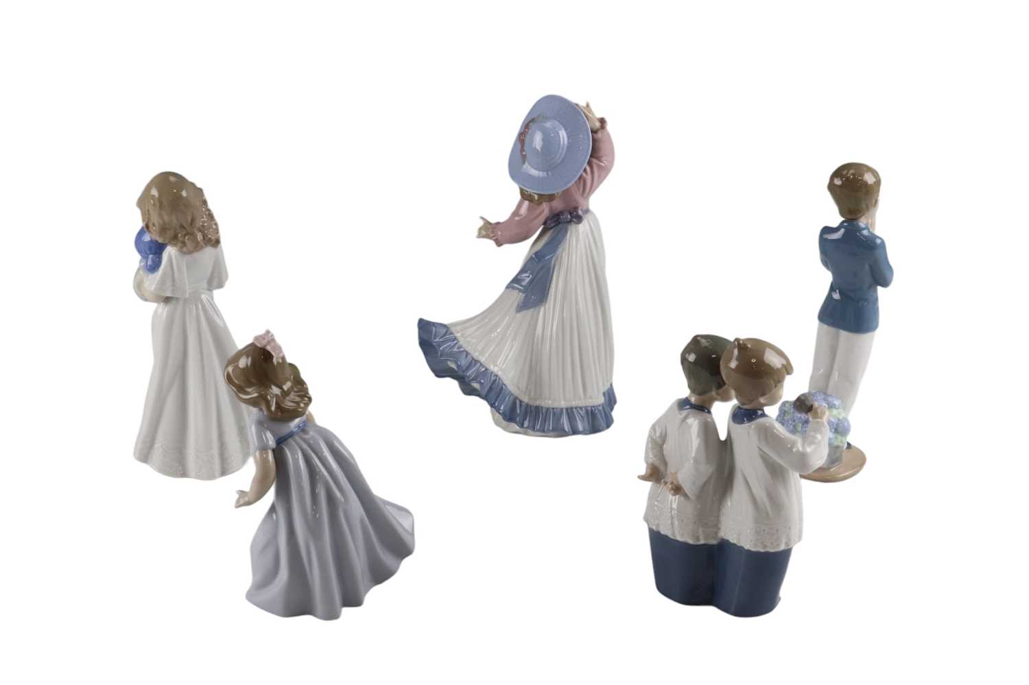 Five Nao figurines including choir boys and a young girl and dog, tallest 24 cm - Image 2 of 2