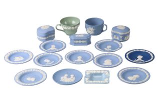 A quantity of Wedgwood blue Jasperware including three lidded boxes, pin dishes, etc