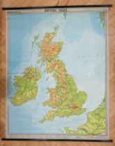 A large cloth backed educational wall map of The British Isles by Georg Westerman, mounted on wooden