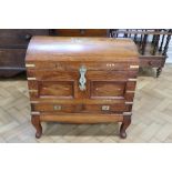 An Indian brass-inlaid mahogany chest, having a "domed" top with brass hasp and padlock opening to