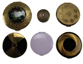 Six early 20th century and later powder compacts including examples by Stratton, Kigu, etc