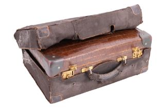 A late 19th / early 20th Century brass-mounted and moire-lined reptile skin small hand luggage