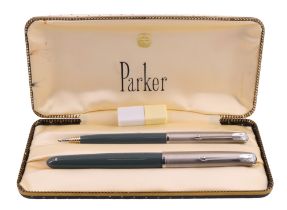 A cased vintage Parker 51 fountain pen and propelling pencil duo