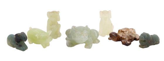 Four carved jade or similar animal figurines comprising a frog, tortoise, pig and a dog, together